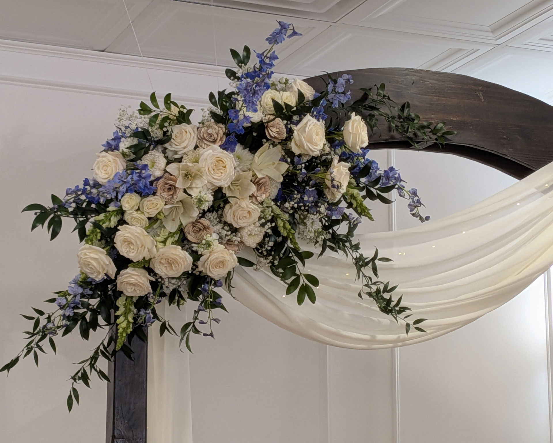 Wedding Ceremony and Reception featuring DIY Floral on Classic Wedding Arch at La Fête Wedding & Event Venue in Provo, Utah.
