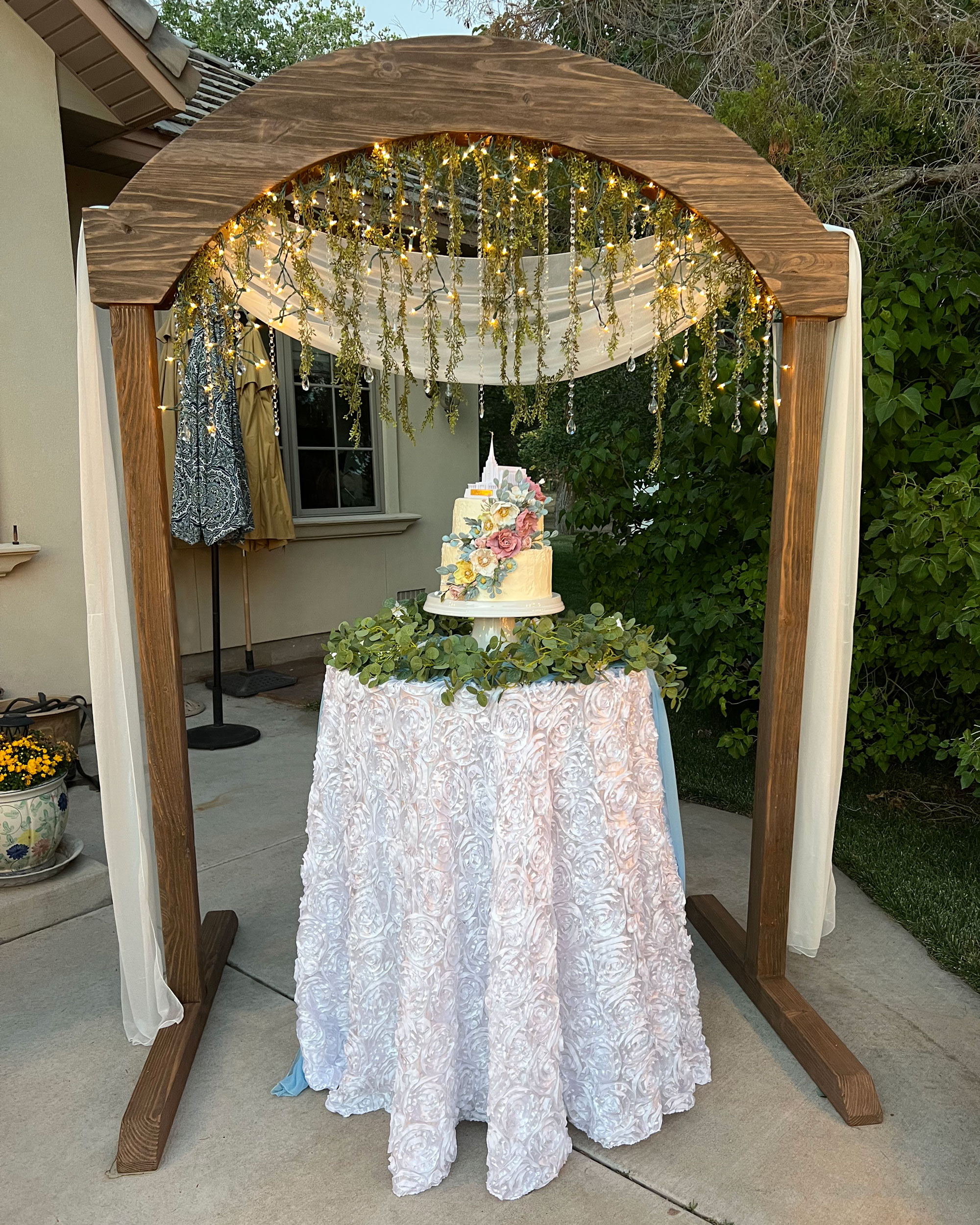 Backyard Wedding Reception featuring Rustic Wedding Arch in Fallon, Nevada.