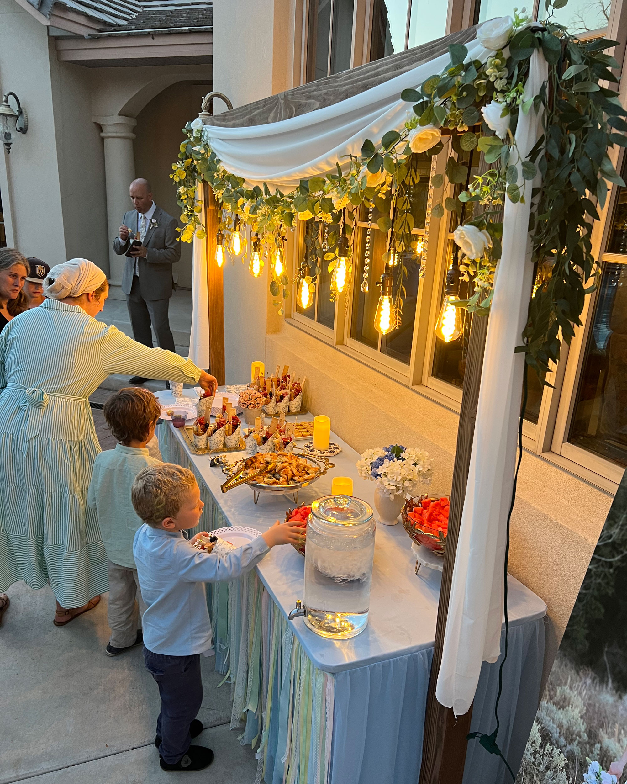 camdas-wedding-arches-rental-utah-rustic-lighted-table-arches-11 Backyard Wedding Reception featuring Rustic Lighted Table Arches in Fallon, Nevada.
