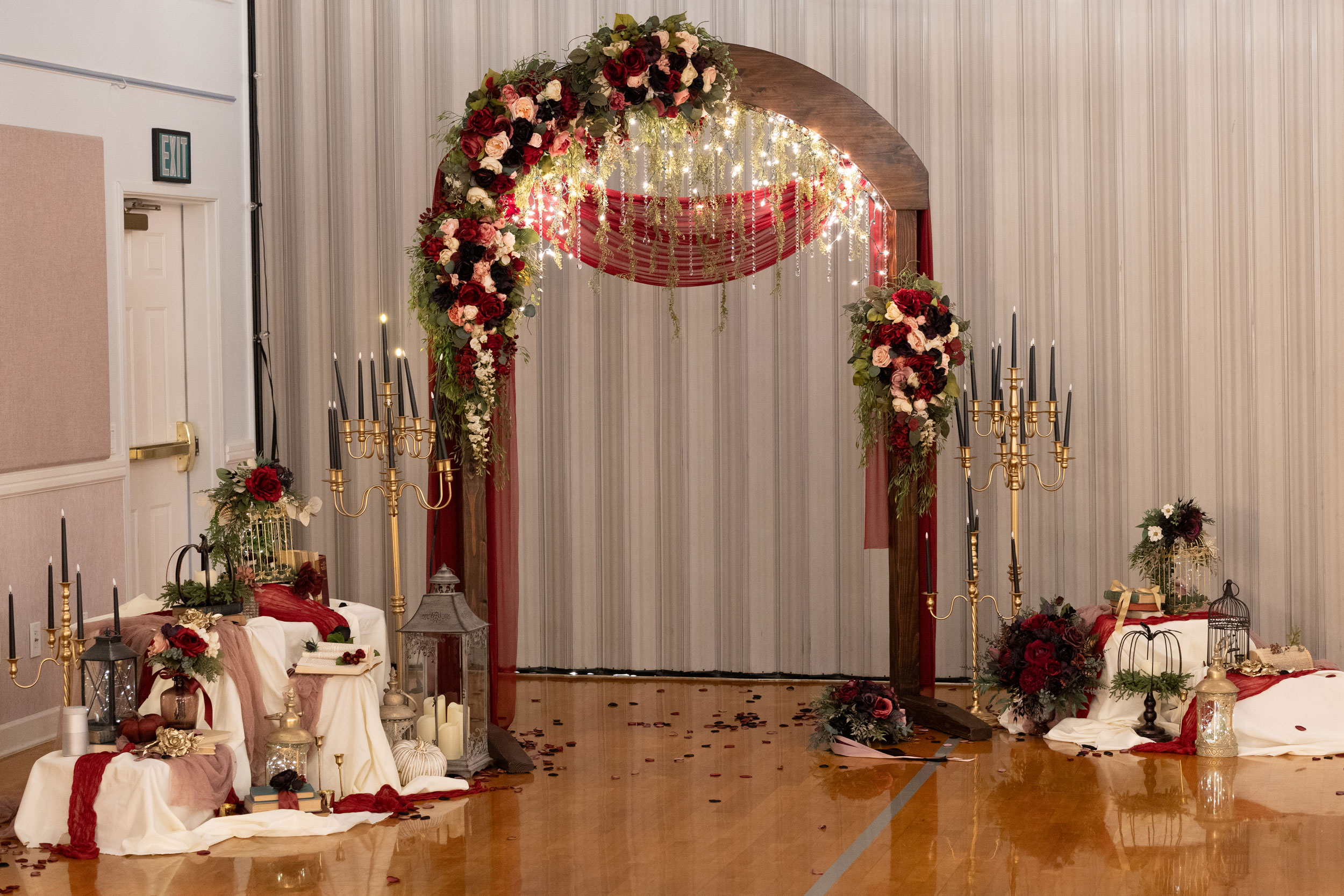Wedding Reception featuring Burgundy Pink Ivory Floral Wedding Arch at LDS Chapel in Orem, Utah.