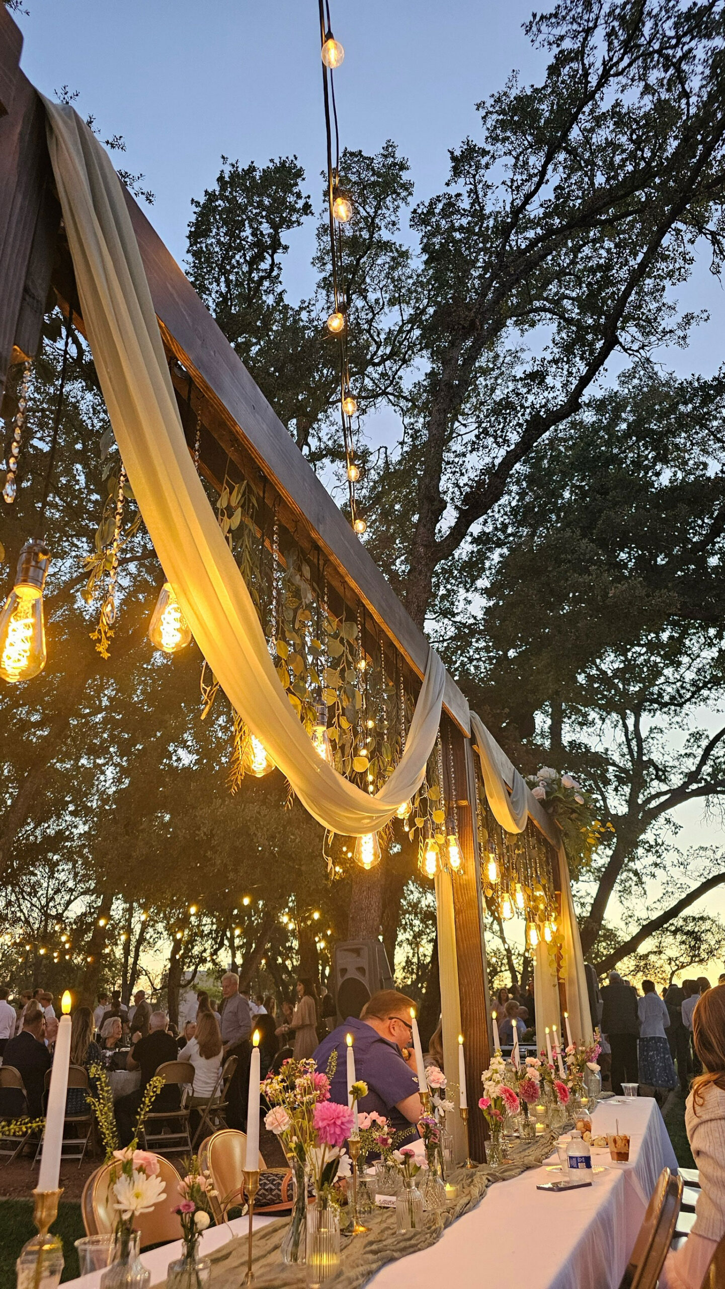 Wedding Reception featuring Wildflower Floral Lighted Table Arches at Rancho Cordova Park in Carmichael, California.
