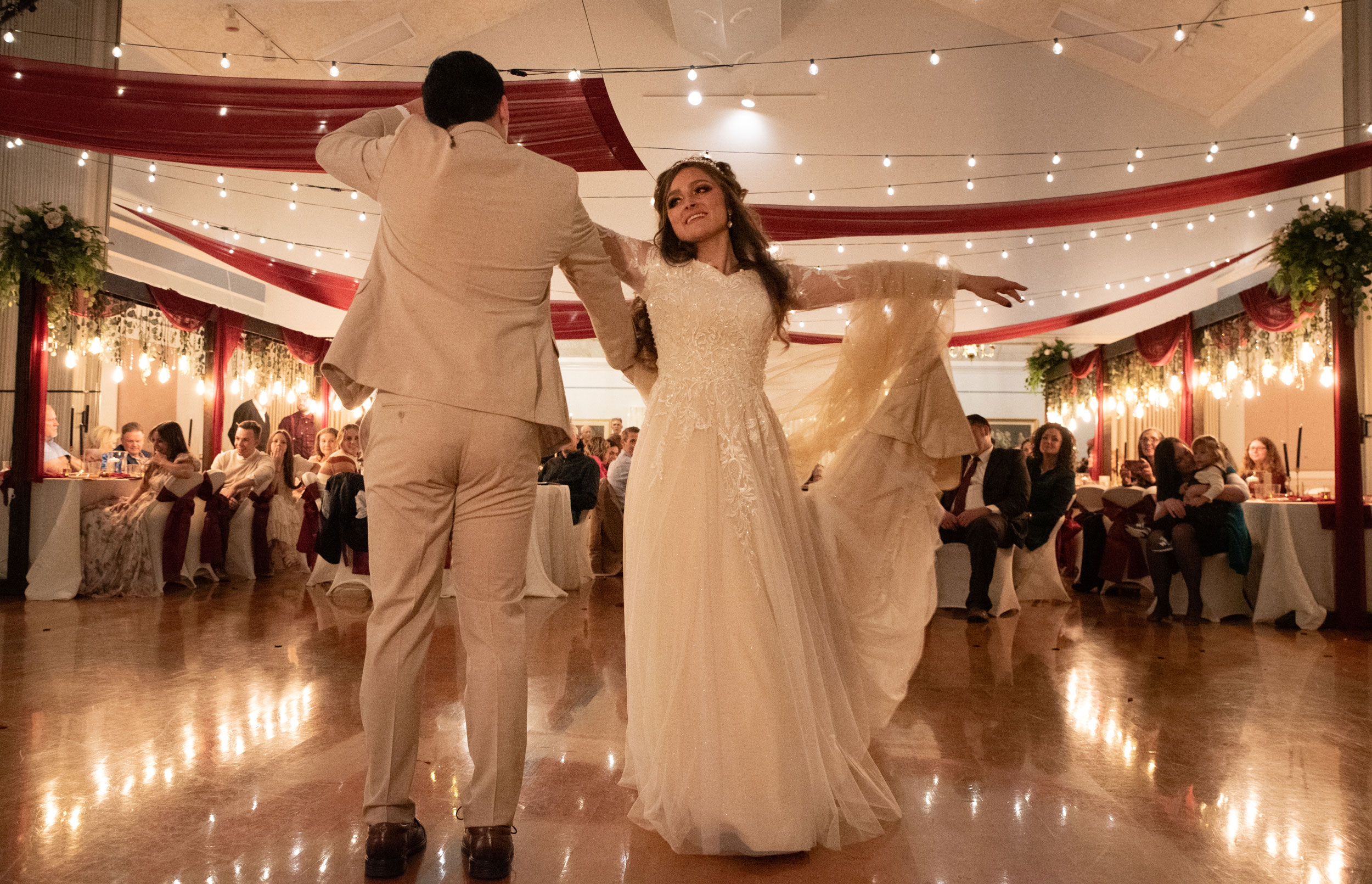 Wedding Reception featuring Lighted Table Arches at LDS Chapel in Orem, Utah.