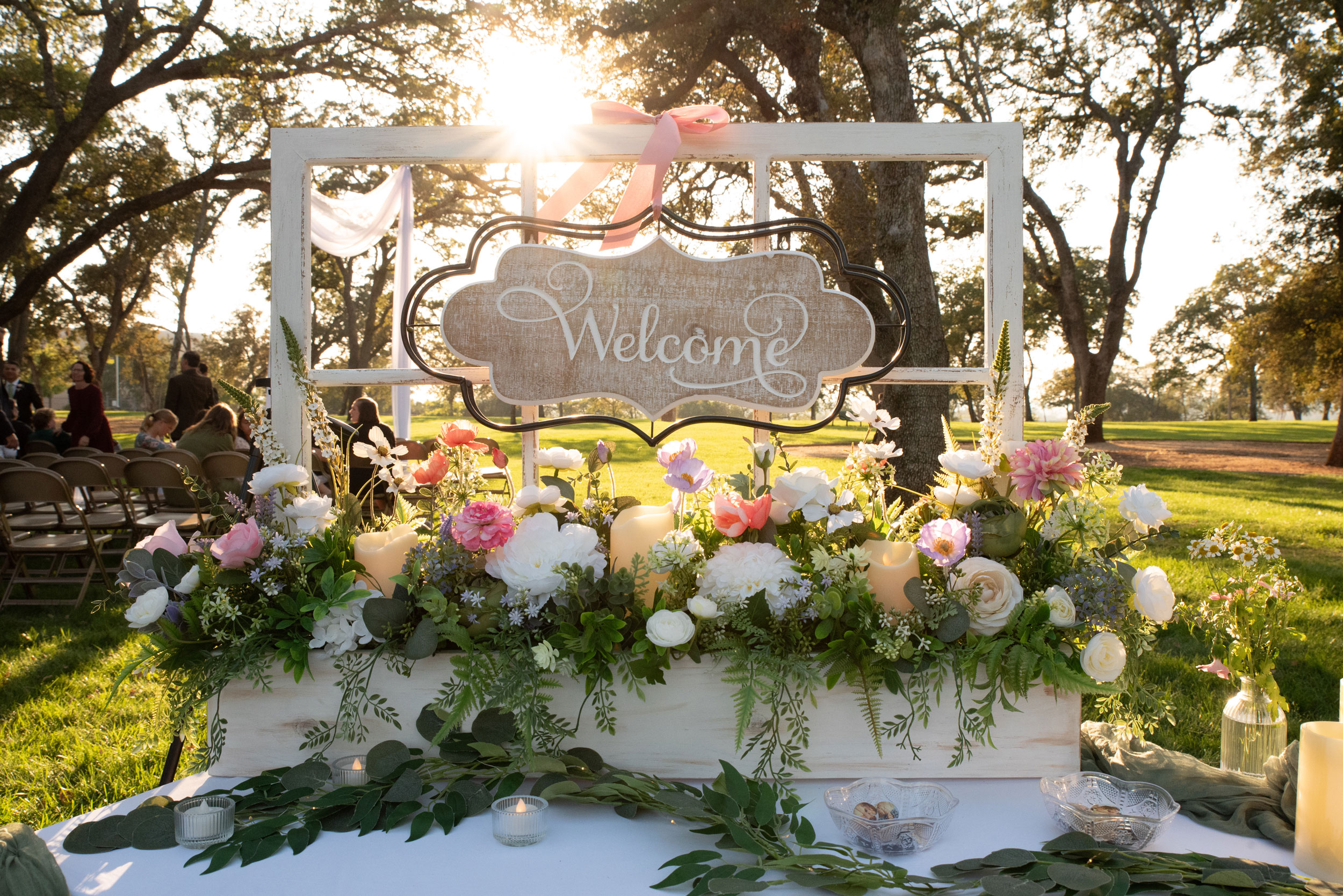 Wedding Reception featuring Wildflower Floral Welcome Window Box at Rancho Cordova Park in Carmichael, California.