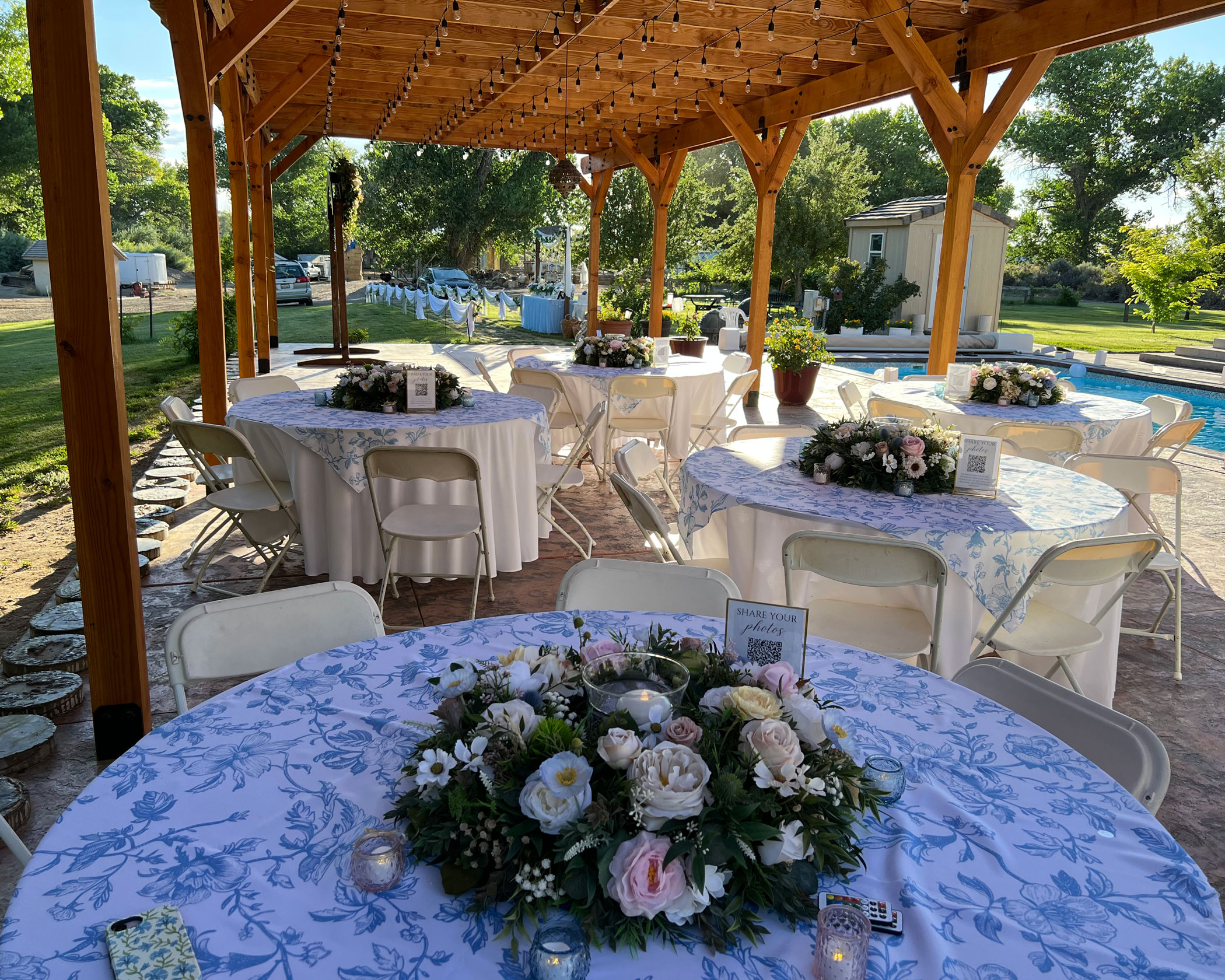 Backyard Wedding Reception featuring Table Wreath Florals in Fallon, Nevada.